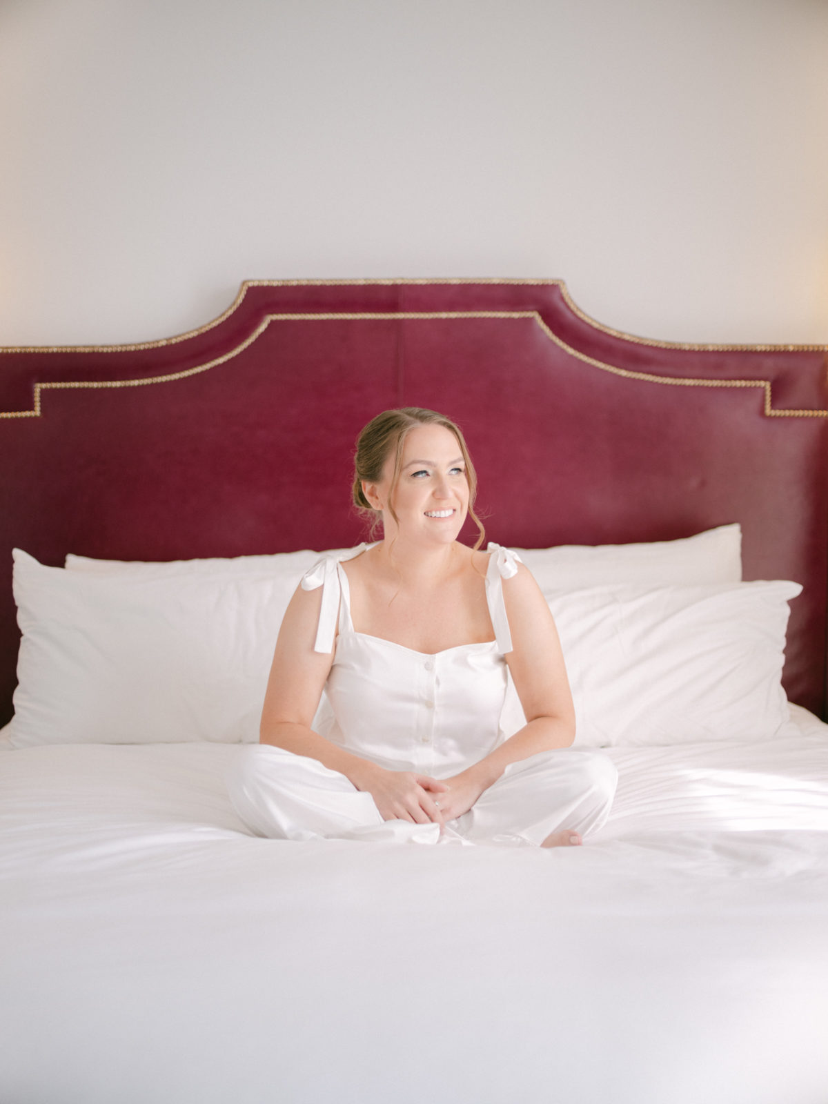 bride sitting on the bed