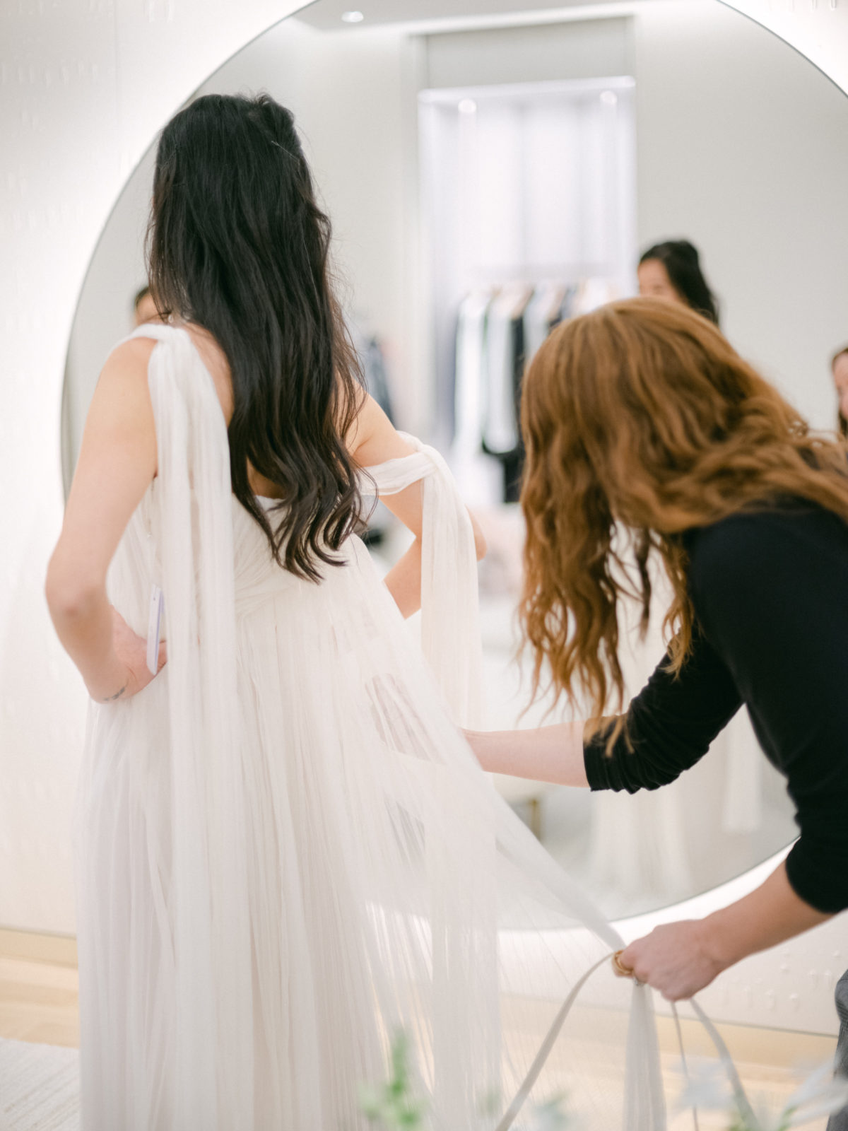 bride getting styled by fashion and bridal stylist Carrie Lauren CLG creative