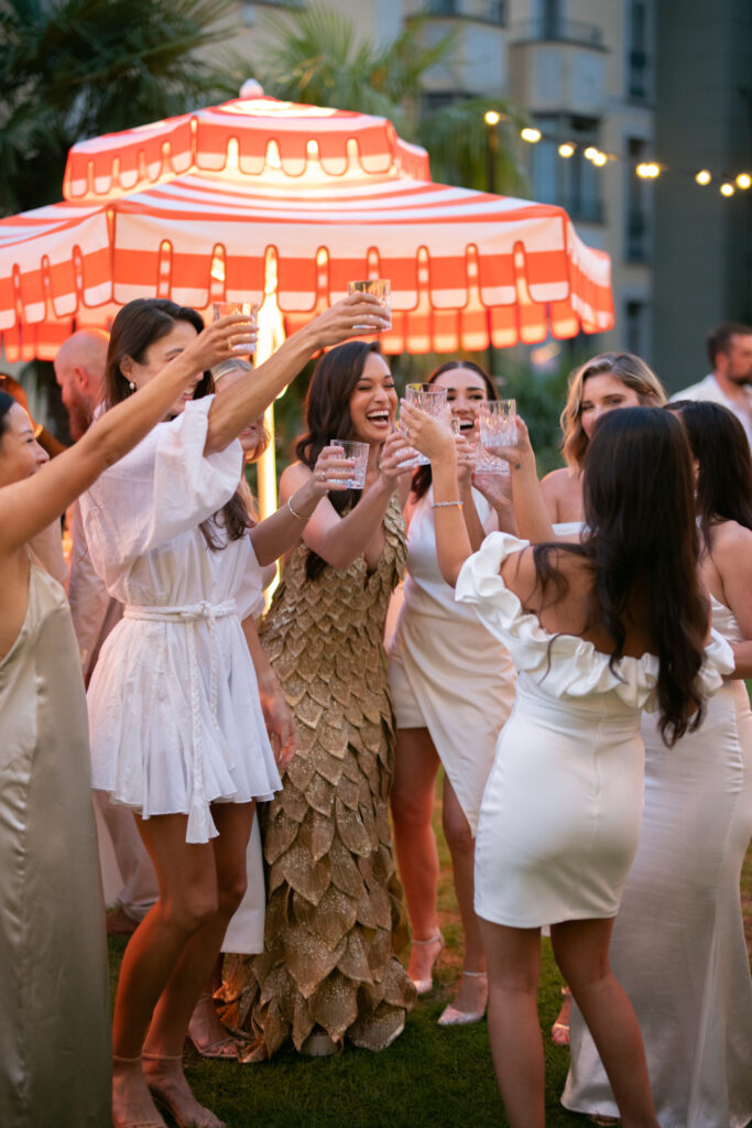 Bride and bridesmaids celebrating in Lake Como